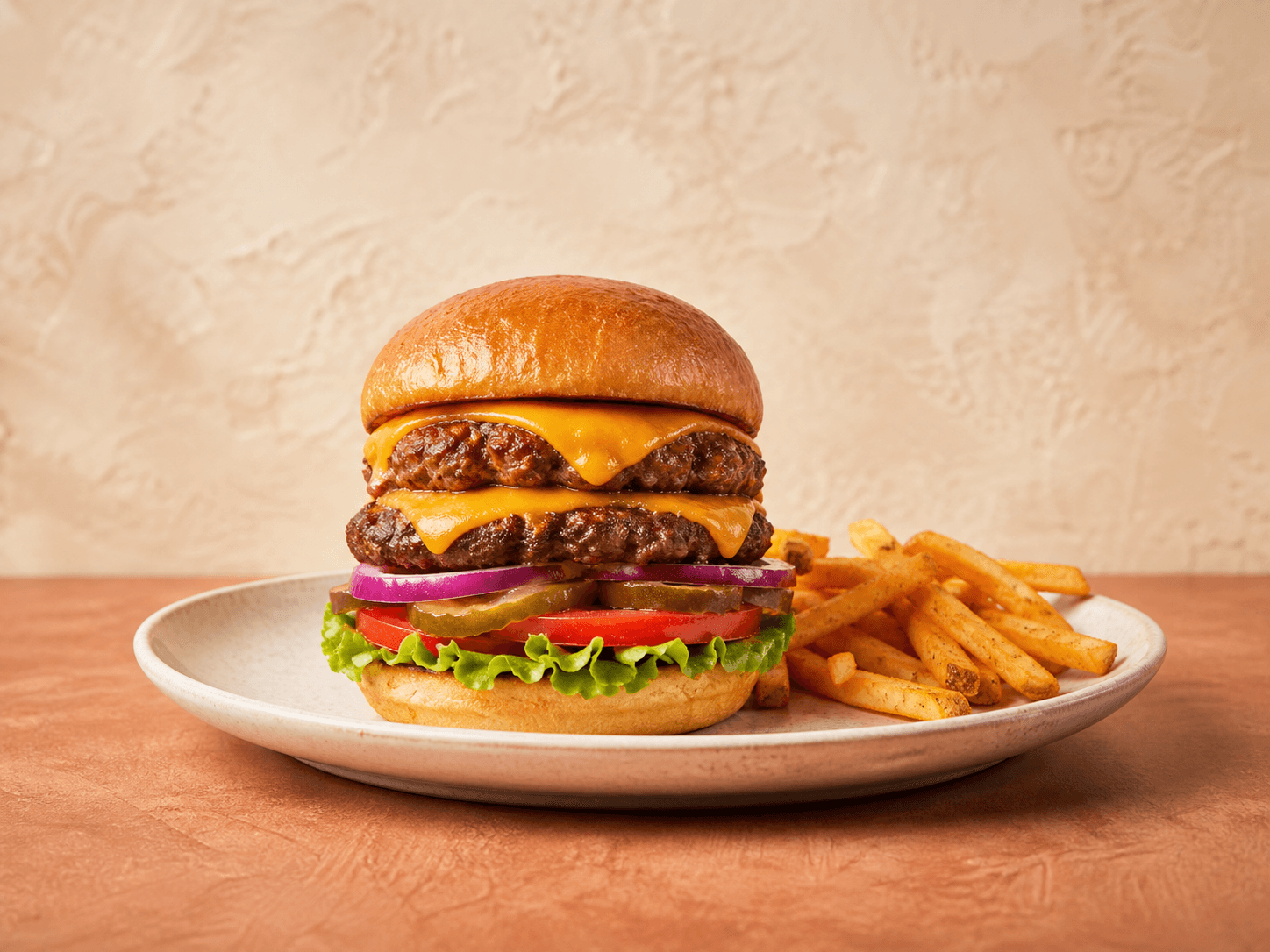 Hamburguesa Clásica doble con papas sazonadas
